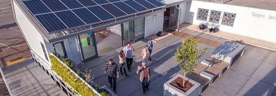 Solar panels on the roof of a modern building